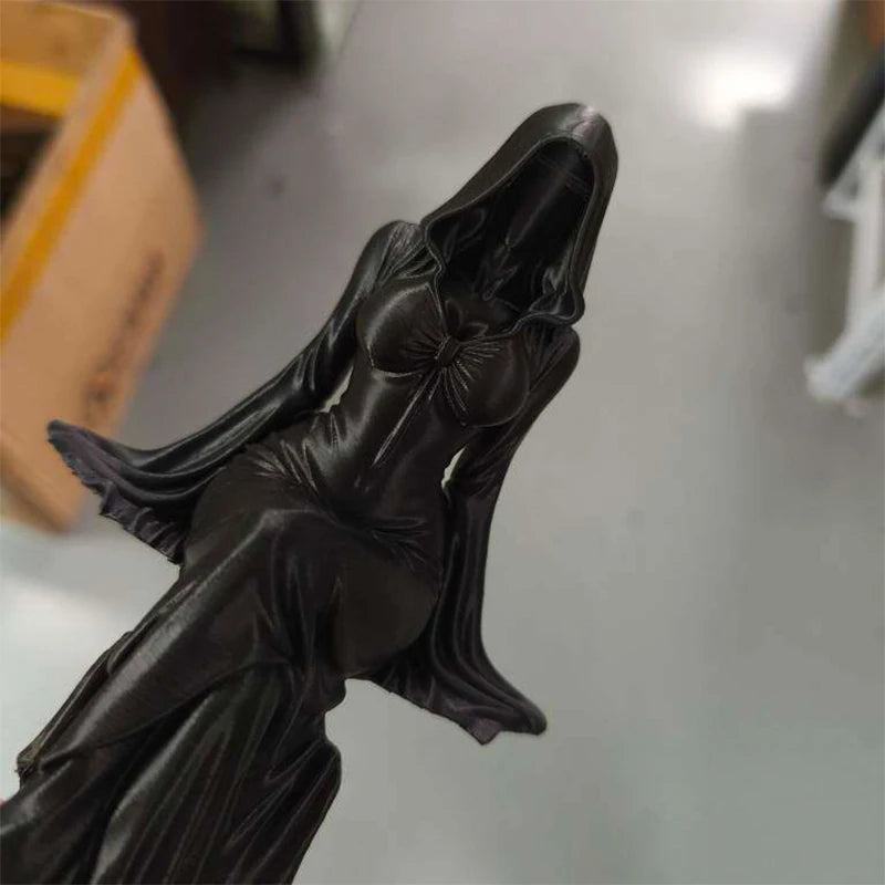 Seated Reaper Figurine