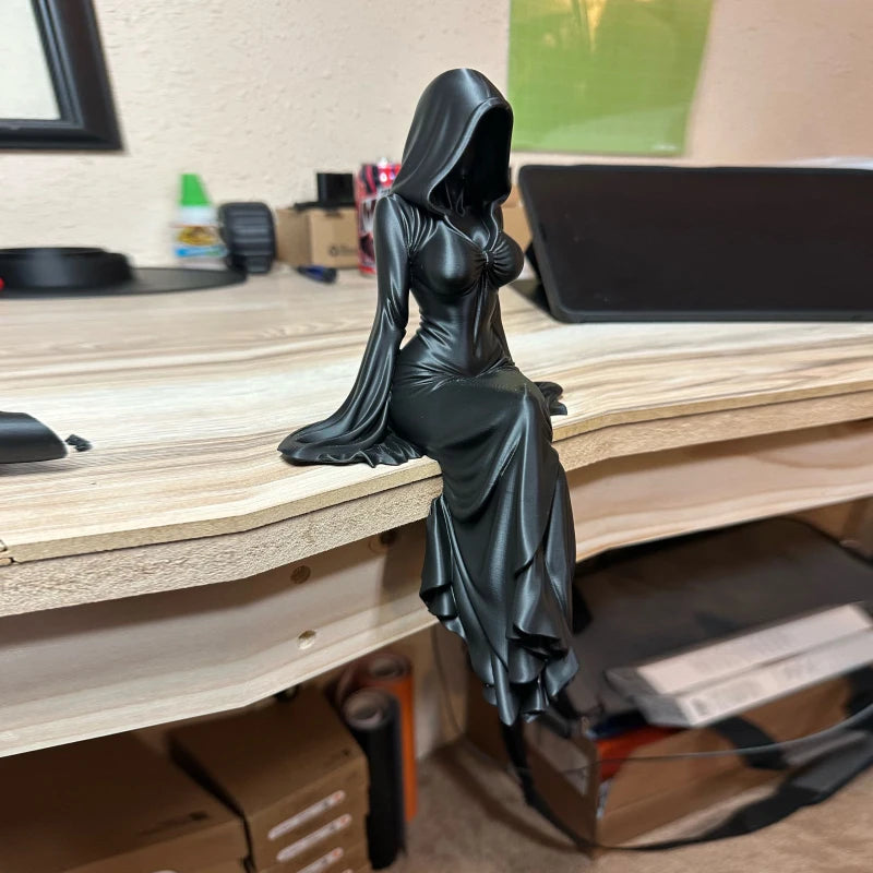 Seated Reaper Figurine