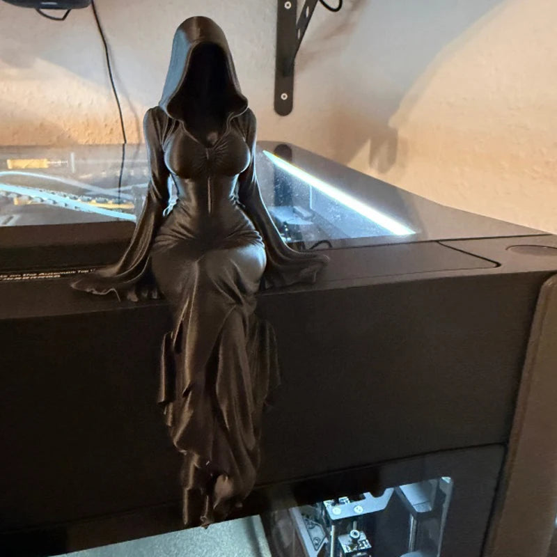 Seated Reaper Figurine