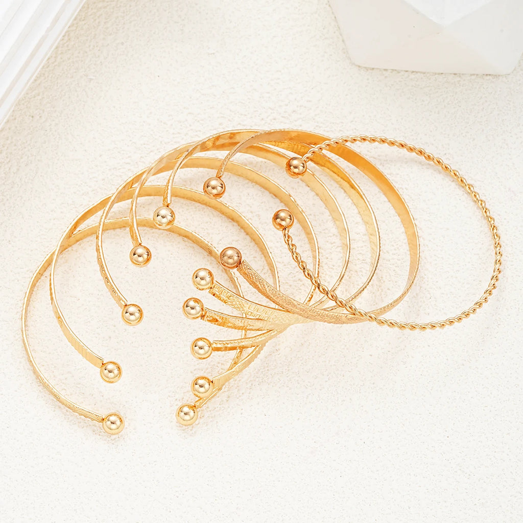 7-Piece Gold Bracelet Set for Women – Gothic Heart Design